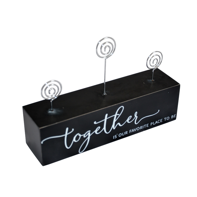 MDF and metal photo and name card clips.  Black MDF base with wording 19S444